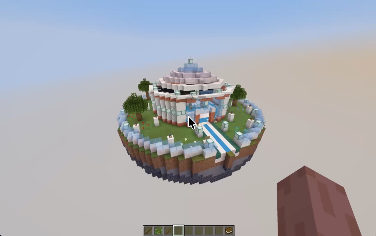 A glowing circular alien HQ on a floating island in Minecraft